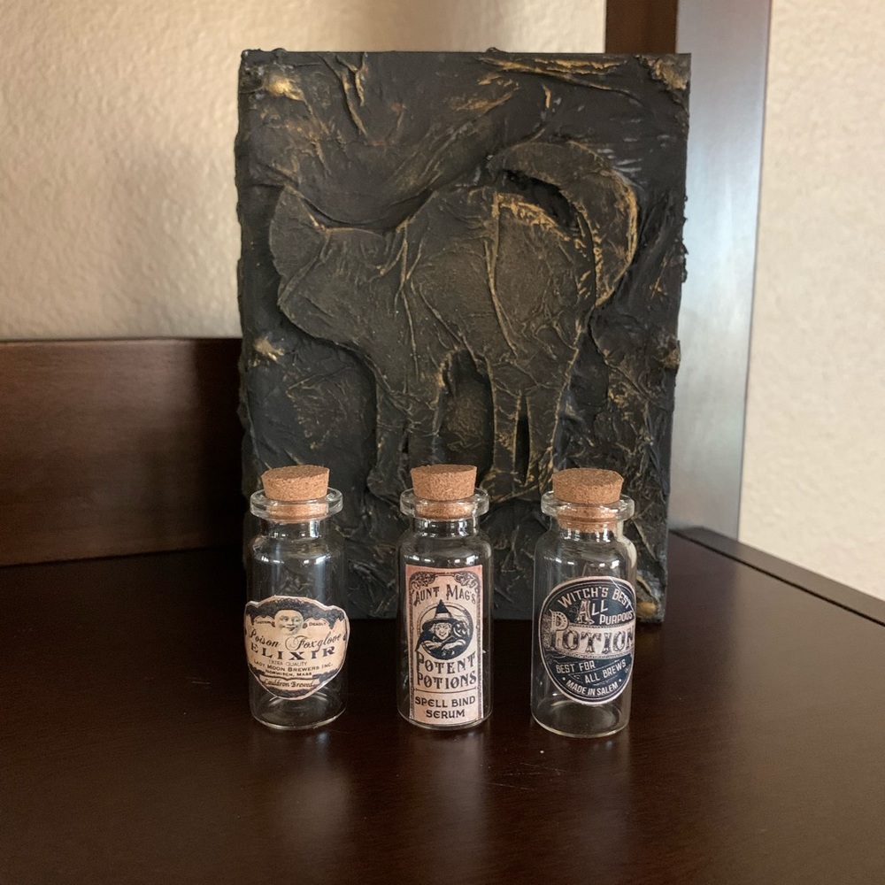 Halloween potion bottles and keepsake book decor